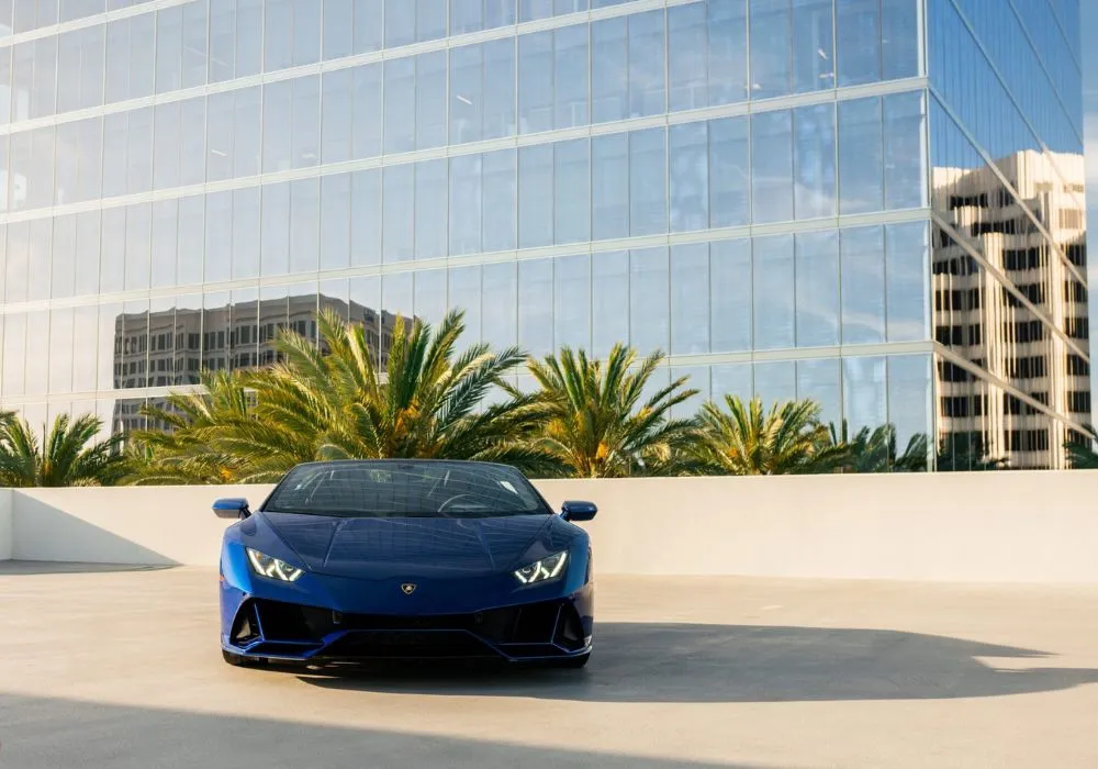 Blue Lamborghini Huracan Evo Spyder rental | Cache Luxe