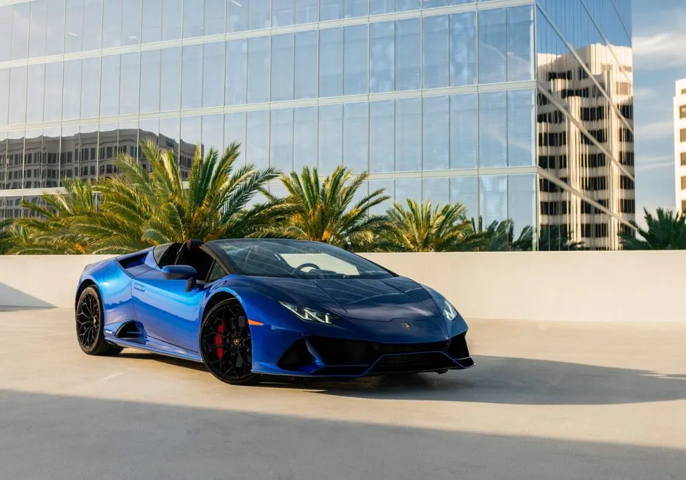 Blue Lamborghini Huracan Evo Spyder rental | Cache Luxe