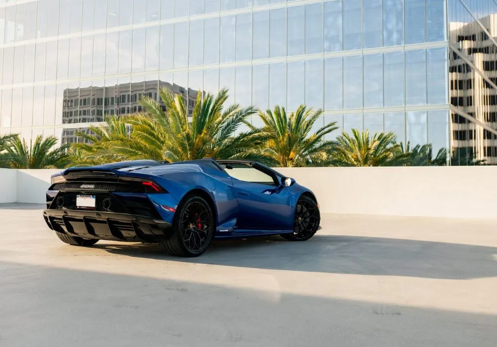 Blue Lamborghini Huracan Evo Spyder rental | Cache Luxe