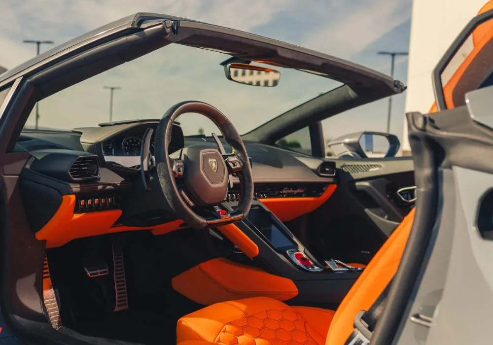 Grey Lamborghini Huracan Evo Spyder rental | Cache Luxe
