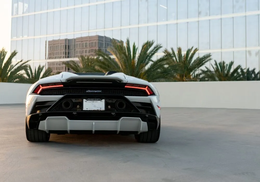 White Lamborghini Huracan Evo Spyder rental | Cache Luxe
