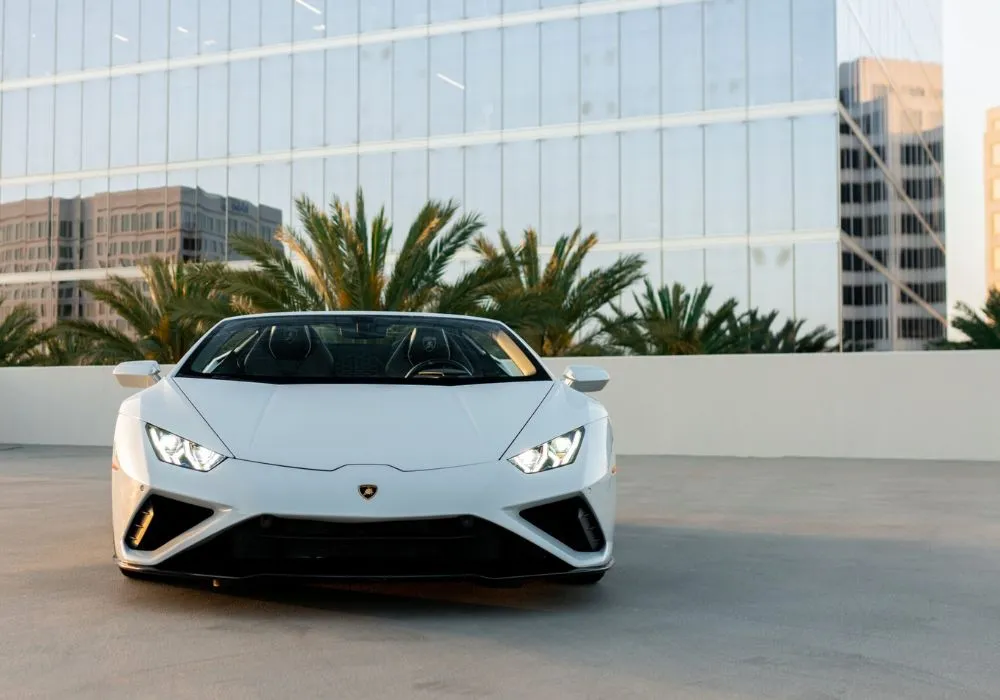 White Lamborghini Huracan Evo Spyder rental | Cache Luxe